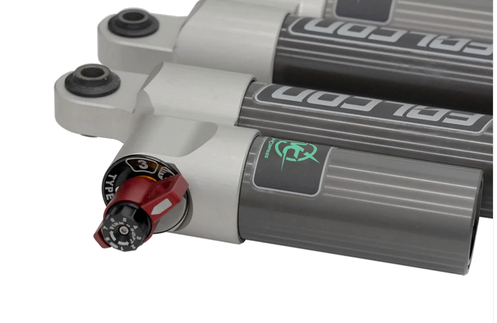 Van Compass tuned Falcon 3.3 Fast Adjust rear shocks for Tiffin Open Trail - focus on red adjustment knob on shock