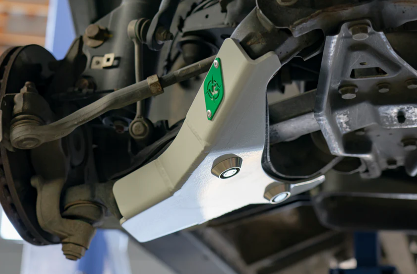 Van Compass Lower Control Arm Skid Plate for Tiffin Open Trail - installed