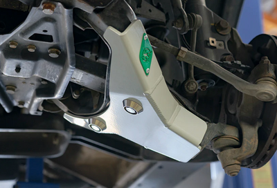 Van Compass Lower Control Arm Skid Plate for Tiffin Open Trail - installed