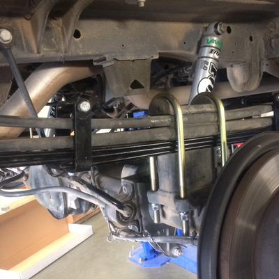 Van Compass Mini Leaf Spring Pack Installed underneath factory 2 leaf pack