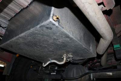Van Compass Rear Storage Trunk viewed from underneath the van. Installed in previous spare tire location.